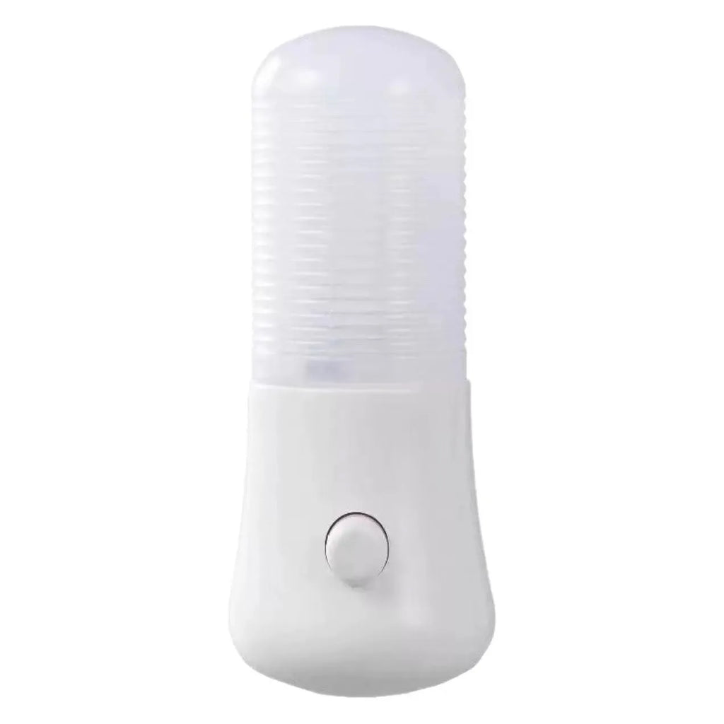 Minimalist white plug-in bedside night light with compact dimensions installed in wall socket