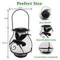 Solar courtyard light with butterfly flame motif, IP55 outdoor rating