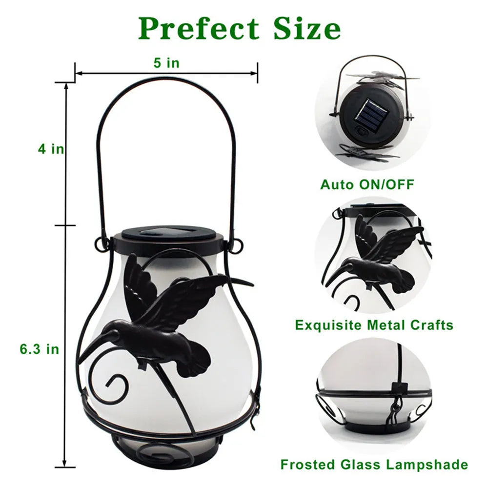 Solar courtyard light with butterfly flame motif, IP55 outdoor rating