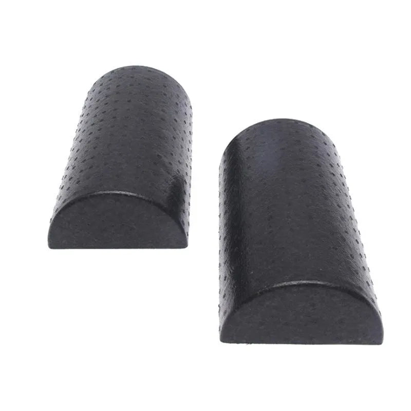 Black semi-circular EPP foam yoga roller 30cm on floor for muscle massage and stretching