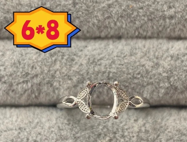 Oval open mouth ring with 6x8mm stone and five-pointed star design on electroplated copper