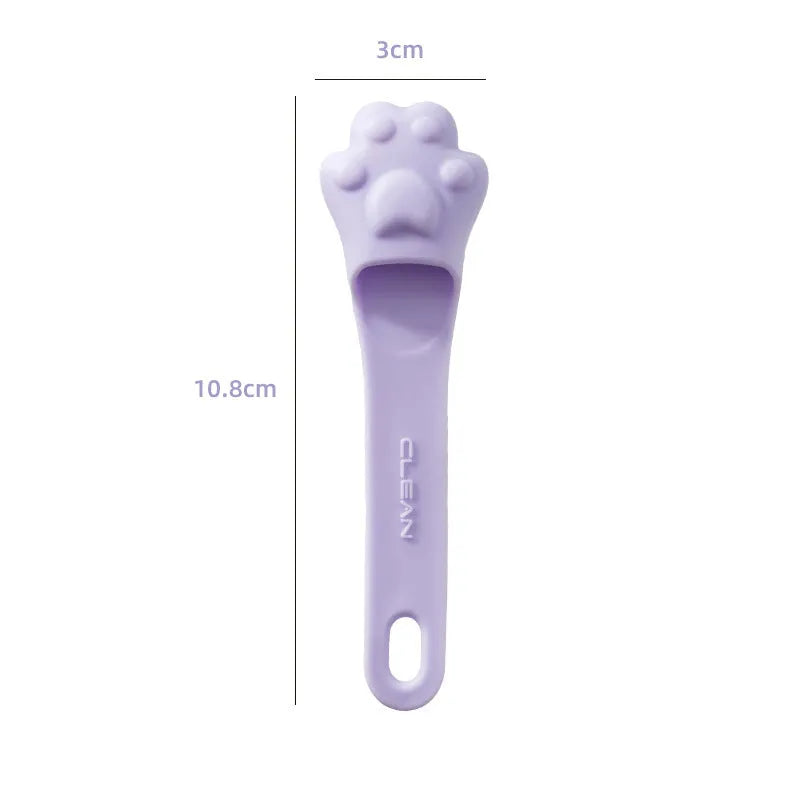 Silicone finger toothbrush for pets in pink, purple and yellow colours