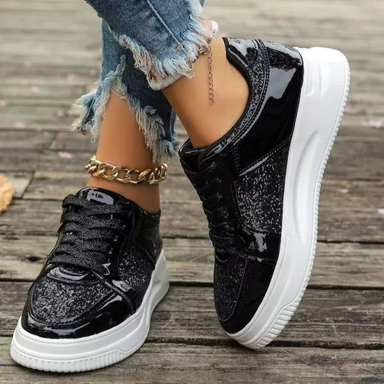 Women's fashion lace-up flat shoes with sequin design, round toe, thick bottom, in silver colour, on a plain background