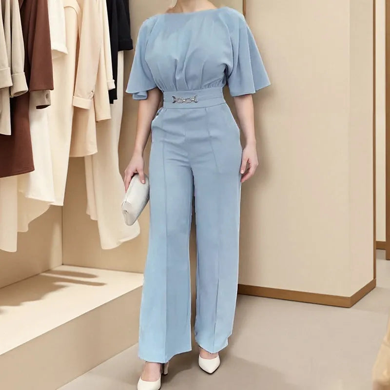 Men's blue slim-fit polyester suit with trousers and long sleeves on a hanger