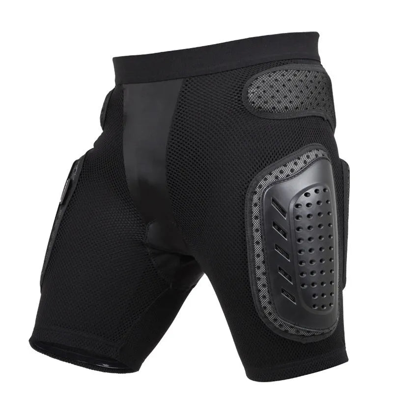 Black cycling hip protection pants showing protective panel positioning for hip impact reduction