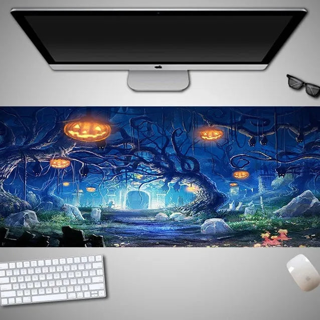 Oversized Halloween-themed gaming mouse pad with non-slip rubber base on a desktop