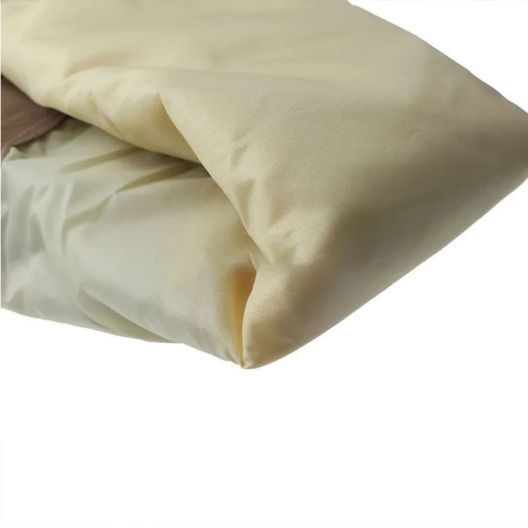 Beige polyester outdoor barbecue dust cover with Nordic style design shown folded