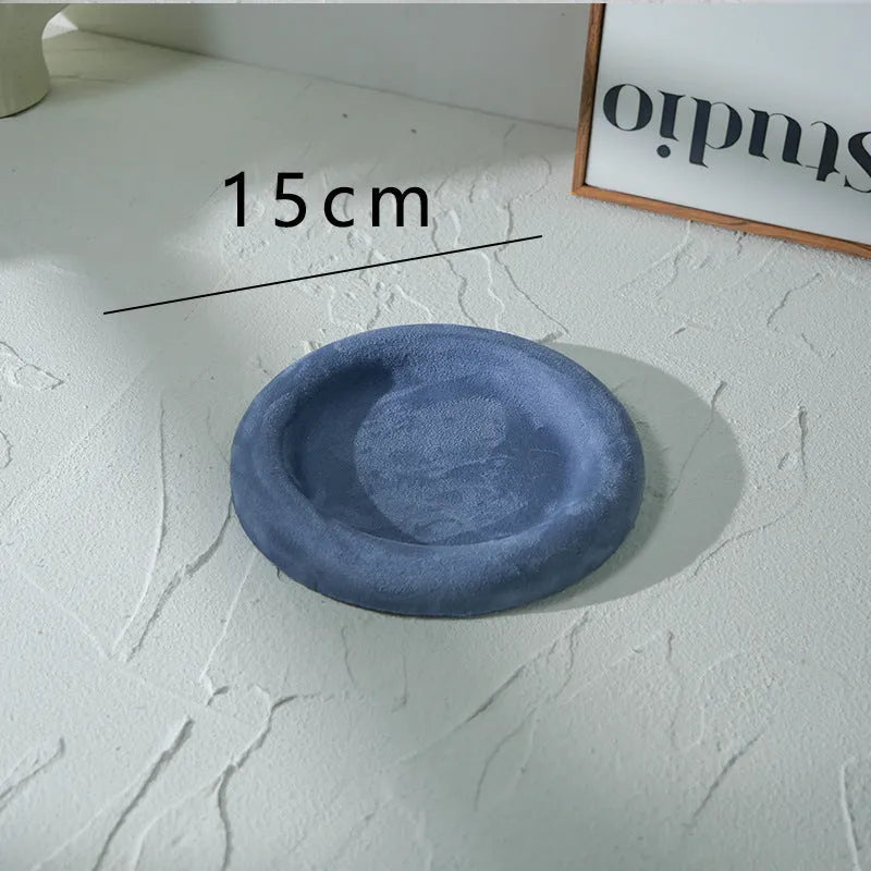Flannel jewellery display stand in light blue with gypsum base showing 15cm round plate