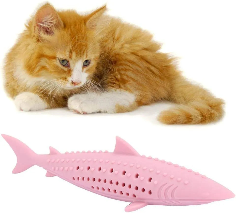 Green fish-shaped silicone chew toy for cats with breathable side holes for dental cleaning and pressure relief