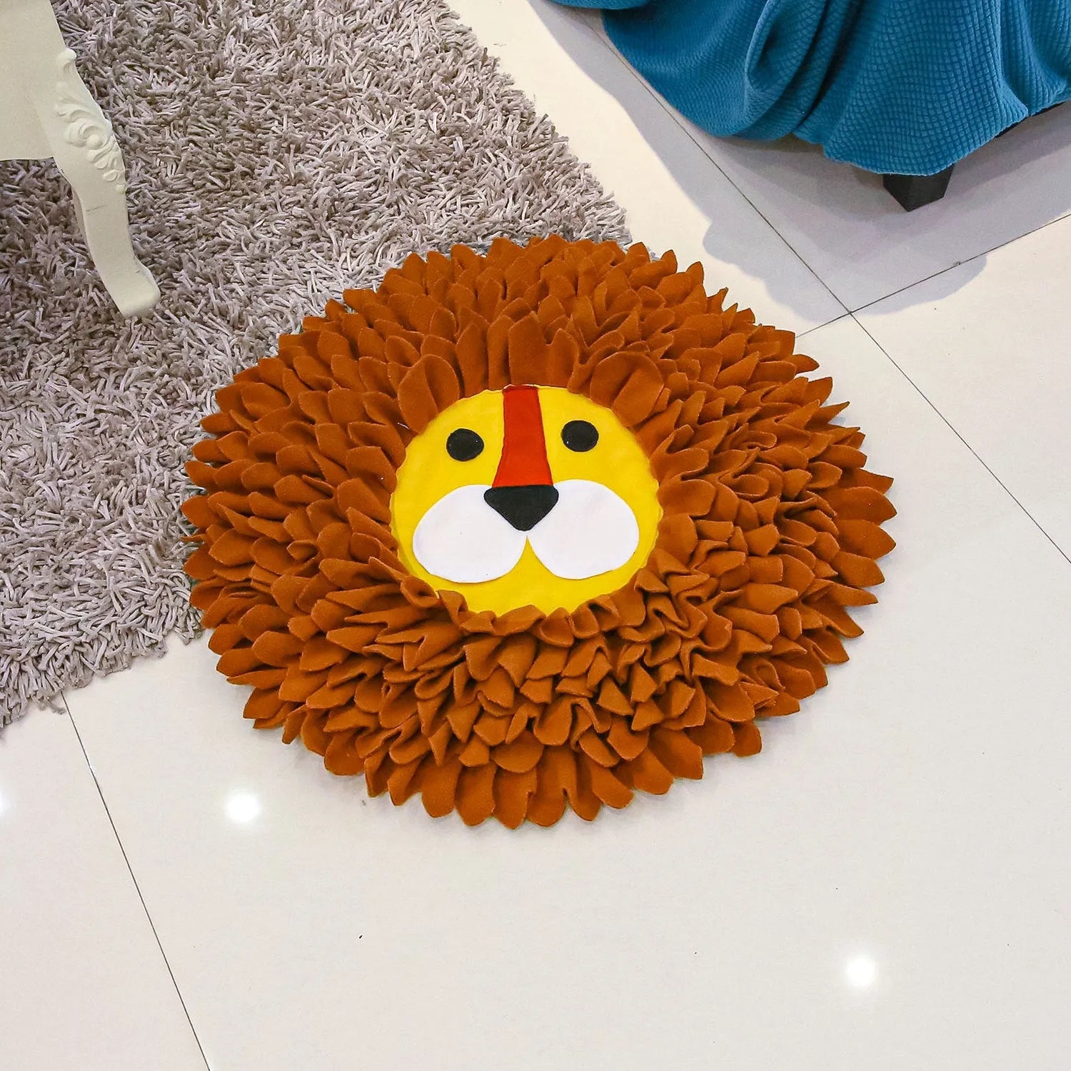 Brown Lion Sniffing Pad pet toy with textured surface for hiding dog or cat treats.