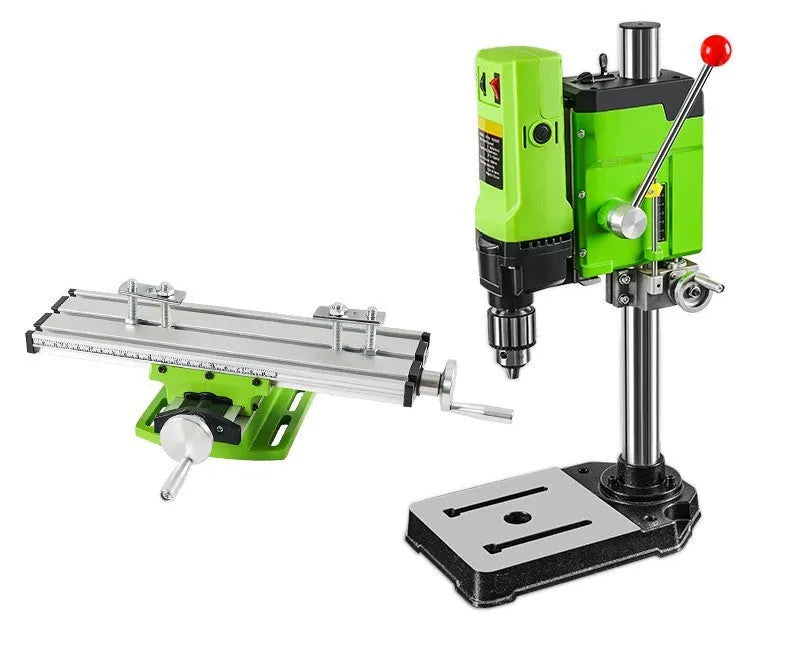 Mini bench drill and milling machine with 1050W drill and bench pliers on a workbench.