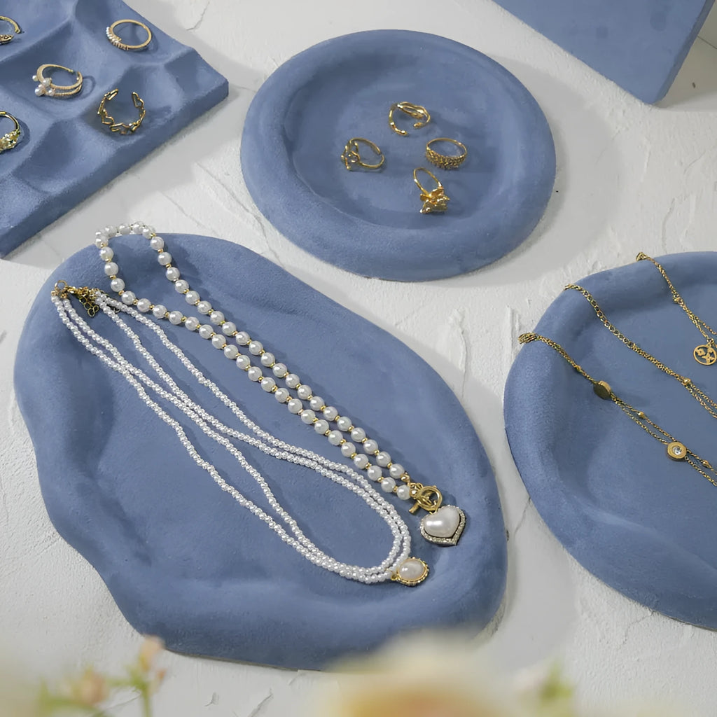 Flannel jewellery display stand in light blue with gypsum base showing 15cm round plate