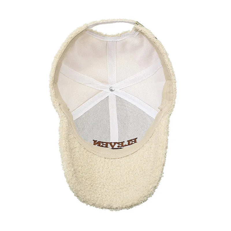 Winter lambskin baseball cap with adjustable strap and dome crown in various colours