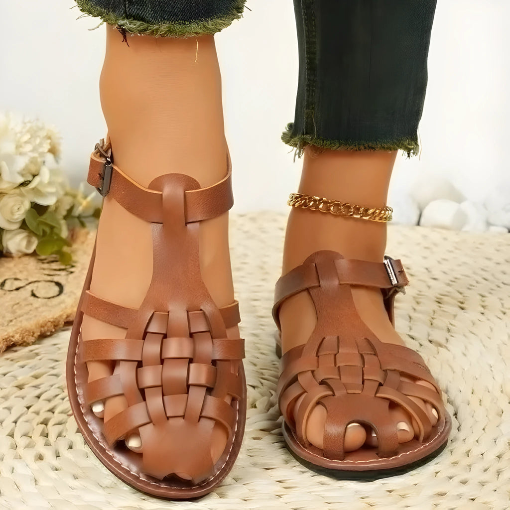 Dark brown women's vintage weave sandals with closed toe and buckle strap.