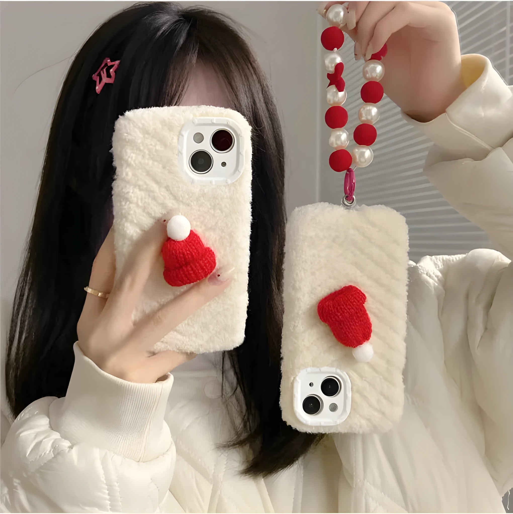 Red silicone phone case with plush Christmas hat bracelet for iPhone on white background