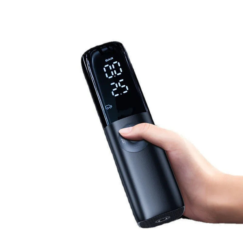 Black portable electric car air pump with tyre pressure gauge and plug