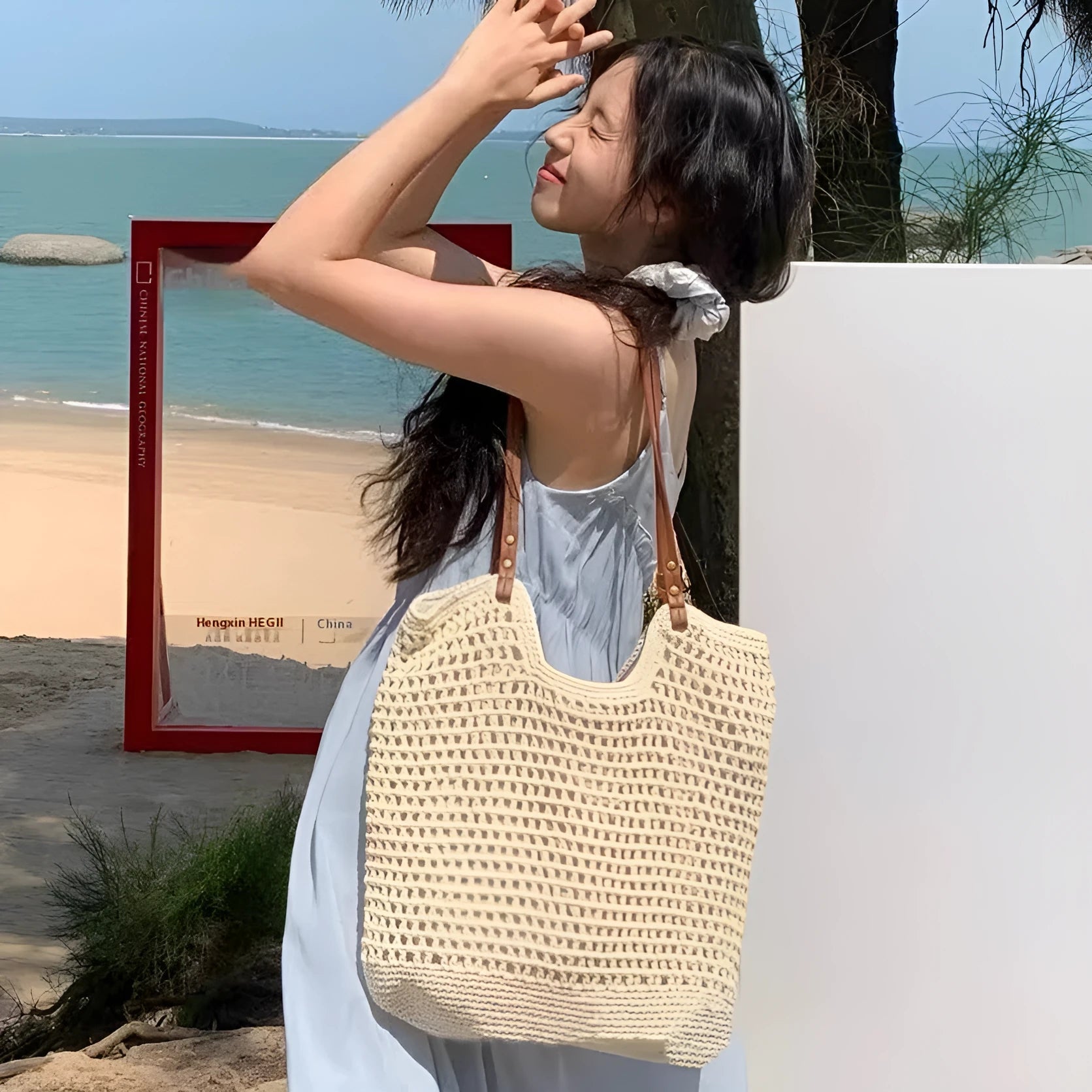 Beige woven cotton linen shoulder bag shown in small and large sizes with magnetic snap and zipper closure options