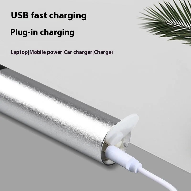 Black and silver aluminium red light therapy mosquito repellent lamp with USB charging port.