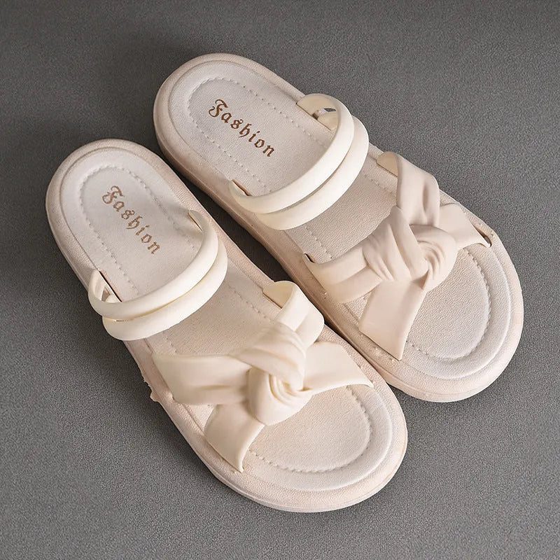 Women's black PVC outdoor sandals showing soft back thick back construction and two-way wear design