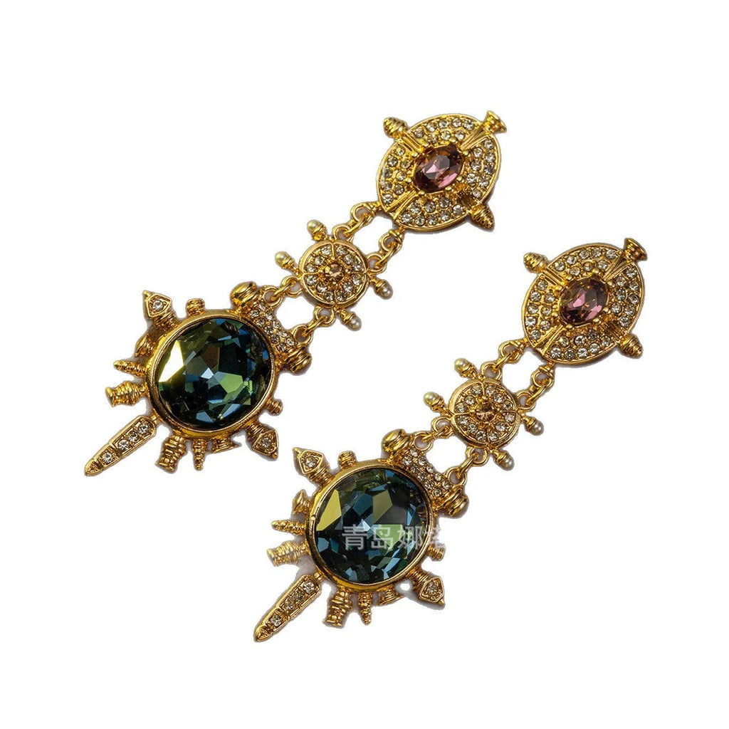 Gold geometric round stud earrings with diamond treatment surface detail