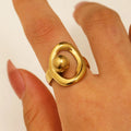 Geometric hollow line open ring in 304 stainless steel with 18K real gold finish, ellipse design