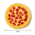 Yellow rubber pizza-shaped dog chew toy with squeaker for interactive play.