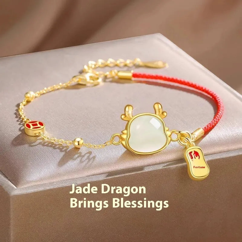 Silver plated dragon zodiac bracelet with Hetian jade detailing on wrist