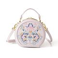 Round PU leather crossbody bag with embroidery and sewing line, available in five colours