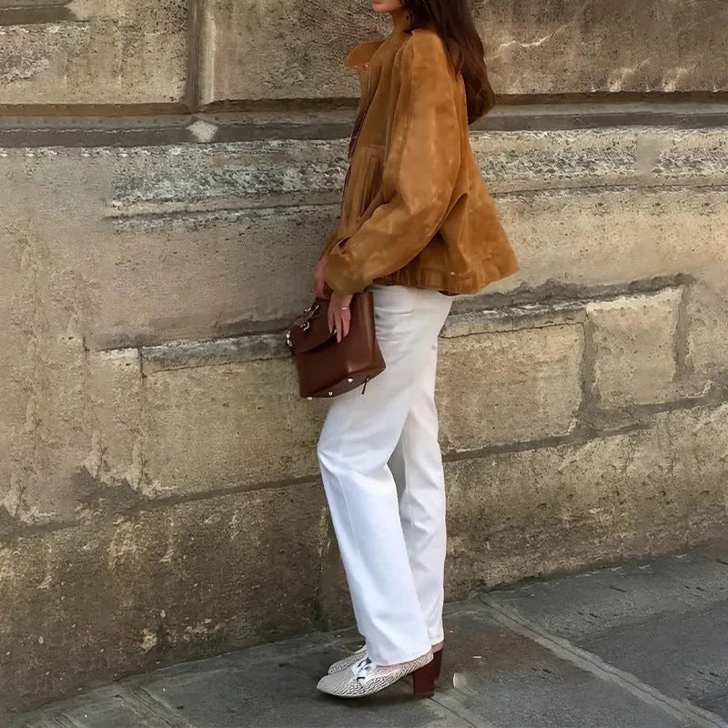 Man wearing a solid colour retro loose-fit polyester jacket.