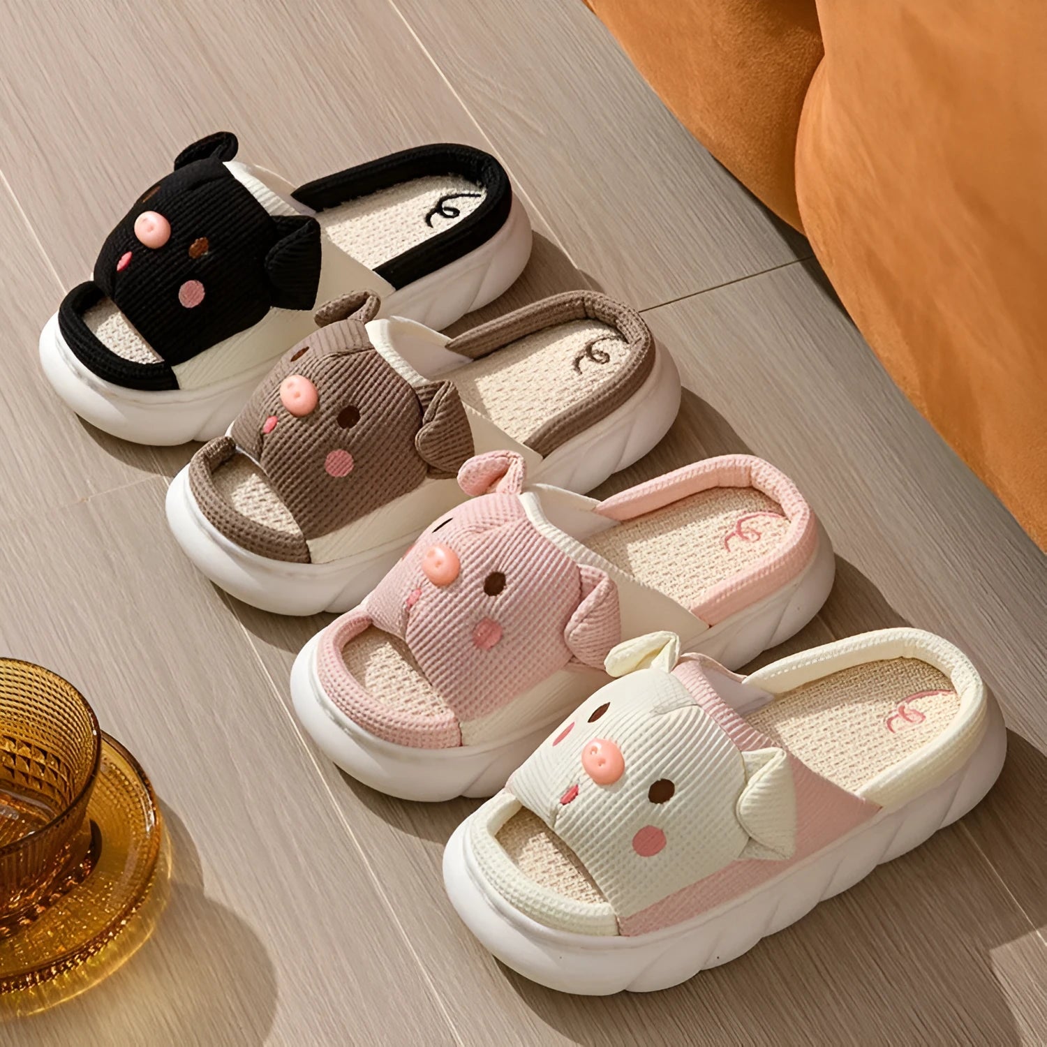 Piggy cute couple open toe linen slippers in pink colour on a white background.