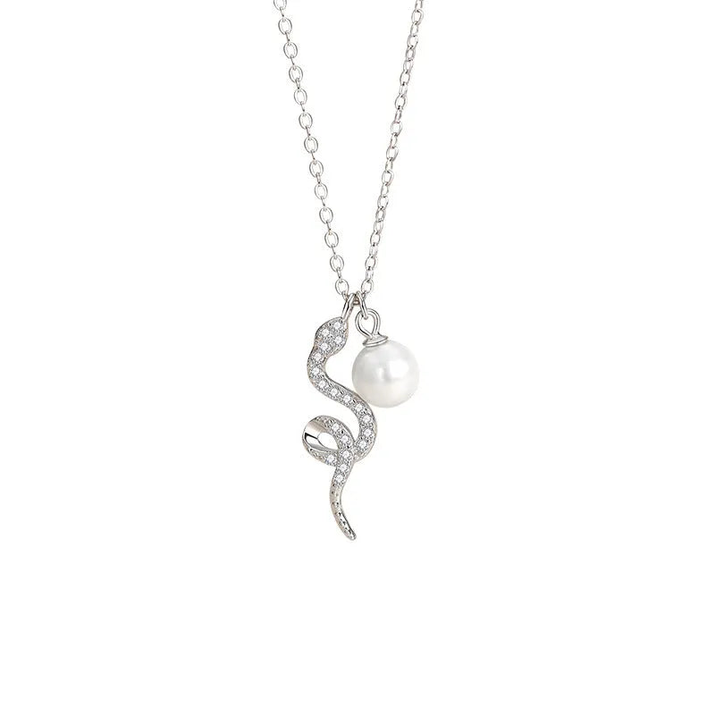 925 silver animal pendant necklace with platinum rose gold colour and Oring chain on a white background