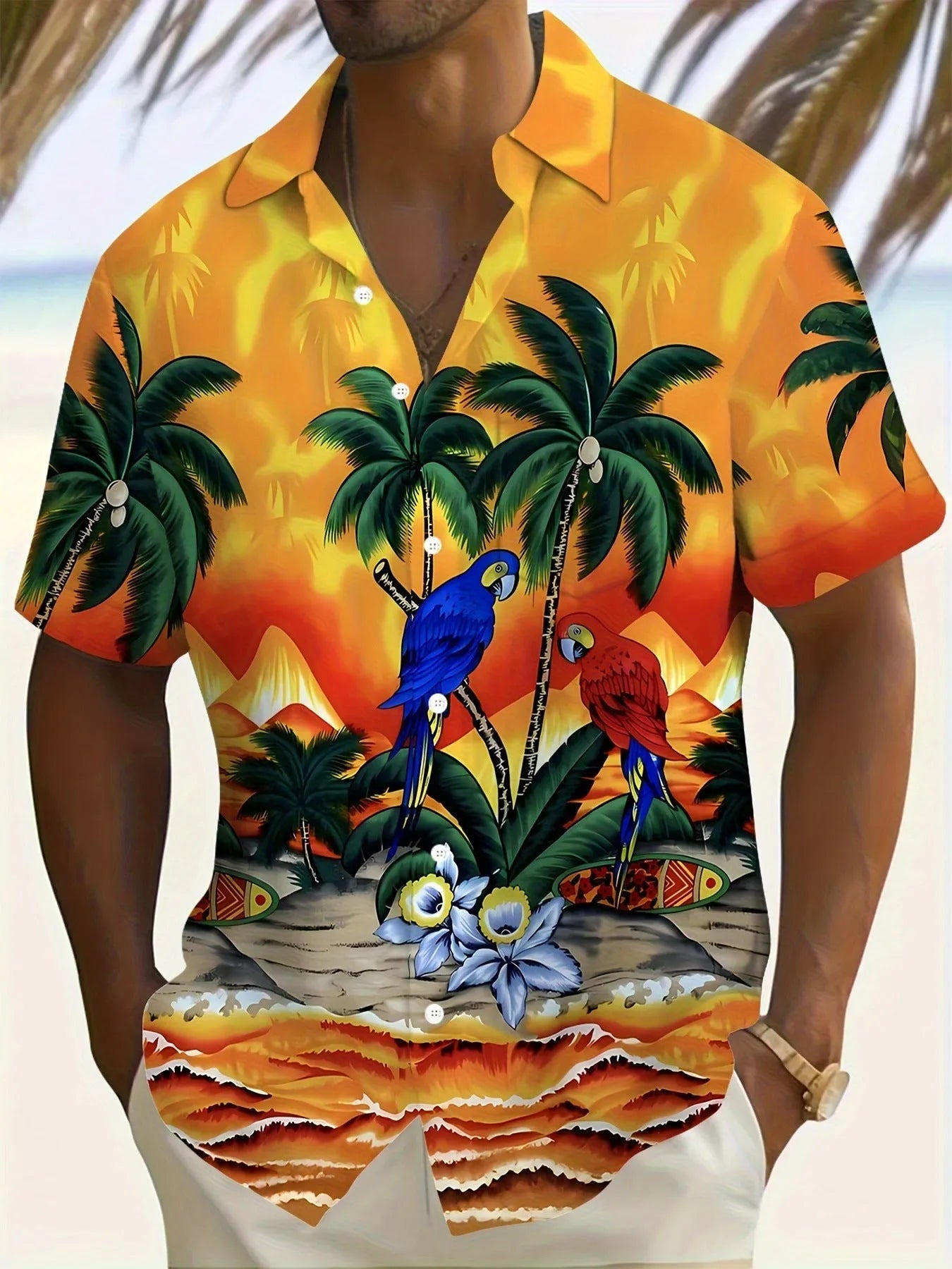 Man wearing a loose-fit floral print short sleeve cardigan-style shirt.