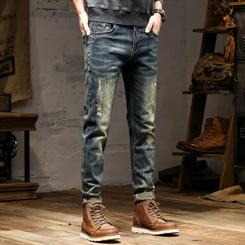 Men's skinny fit stretch jeans in a retro colour, showing zip fly and cotton denim fabric.