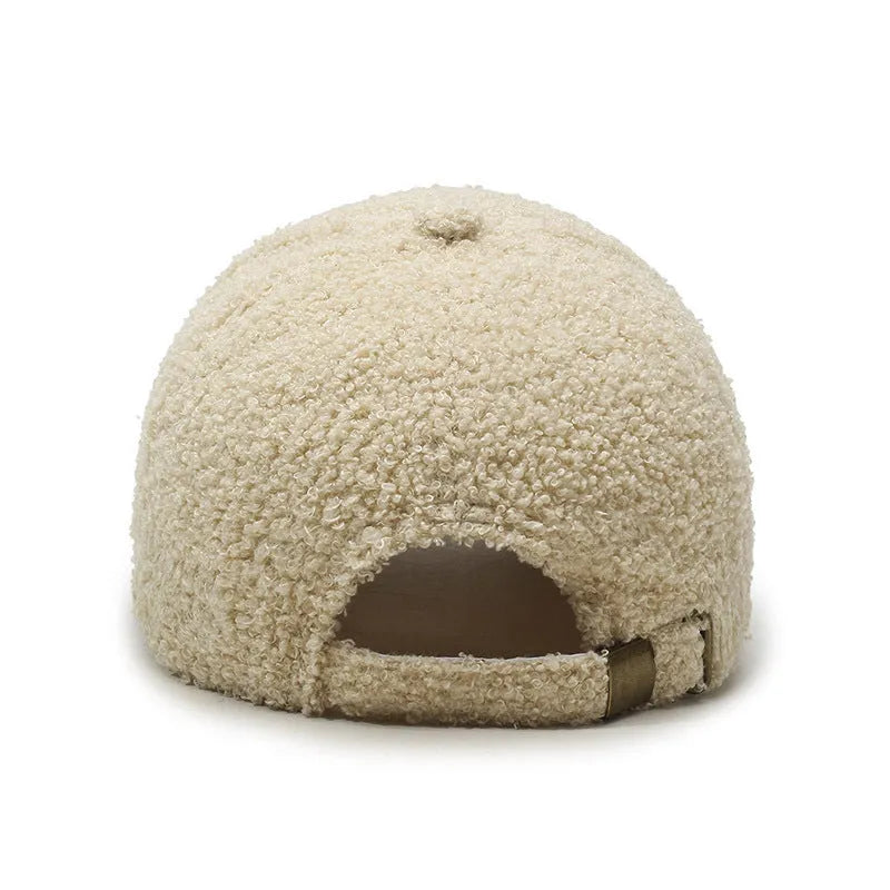 Winter lambskin baseball cap with adjustable strap and dome crown in various colours