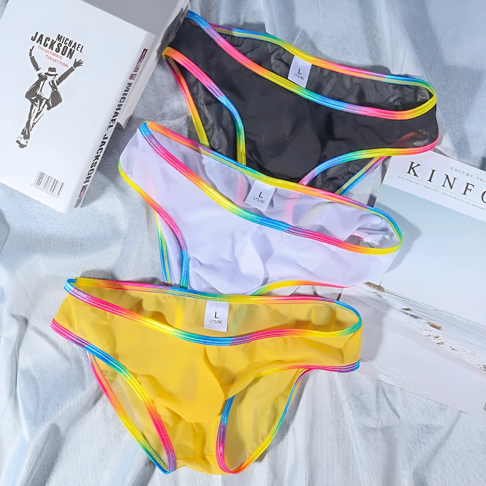 Women's transparent mesh briefs in multiple colours showing knitted nylon fabric construction
