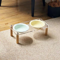 Cream yellow single ceramic cat bowl with wooden rack, anti-tumble design for elevated cat feeding