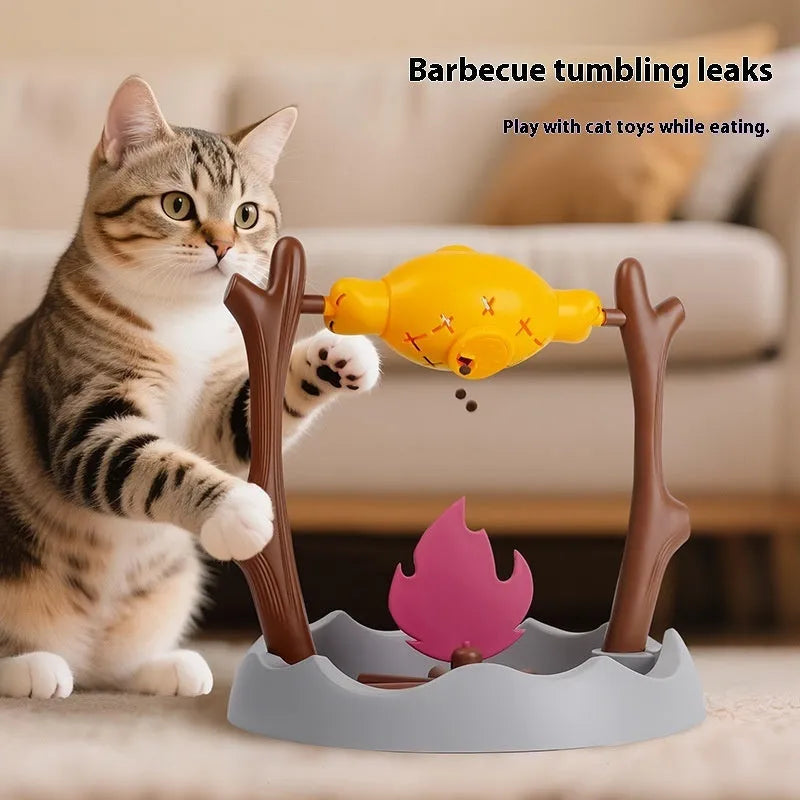 Barbecue-shaped tumbling cat toy with food dispenser, measuring 30x30x29 cm.