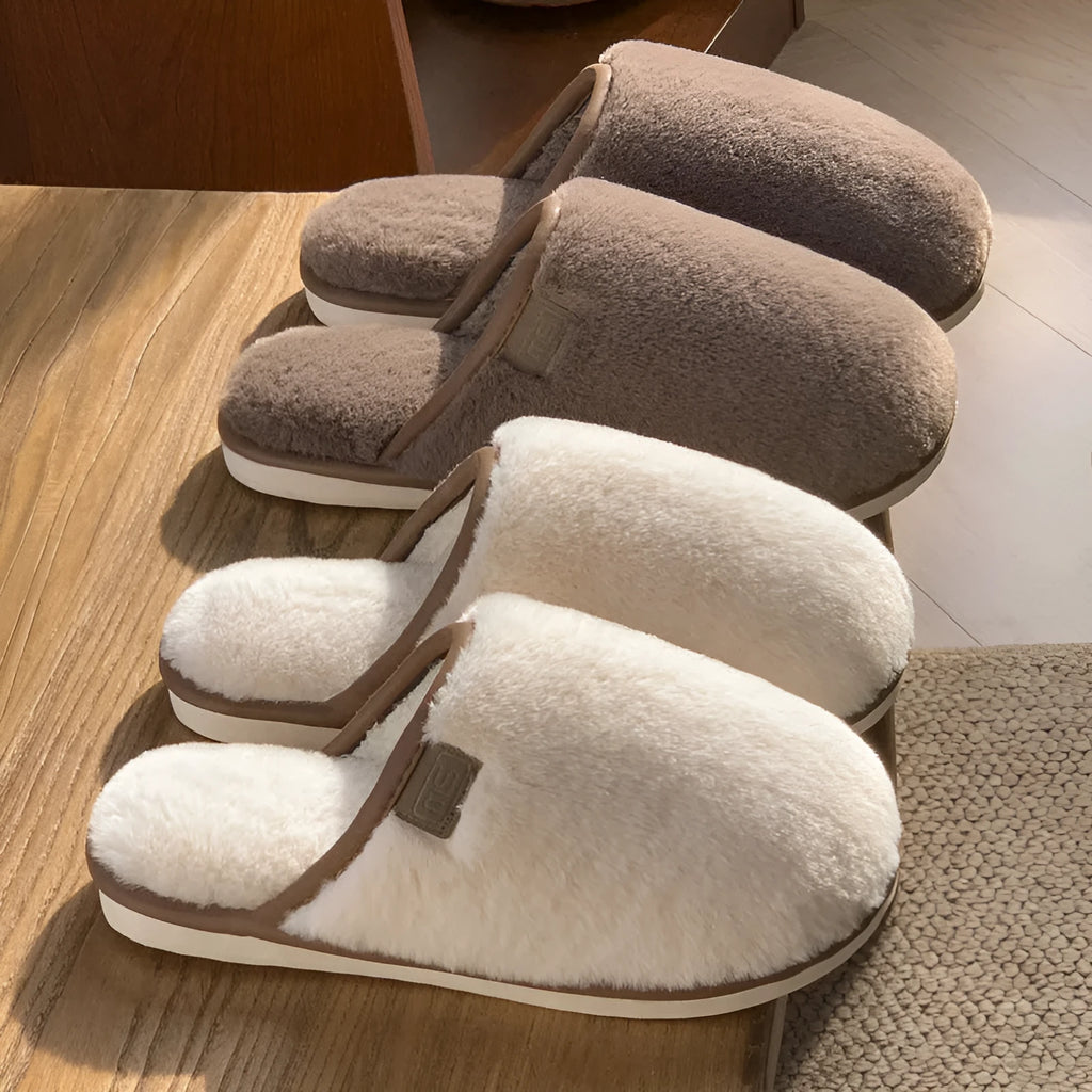 A pair of solid-colour winter plush slippers with a non-slip PVC sole, shown in a selection of available colours.