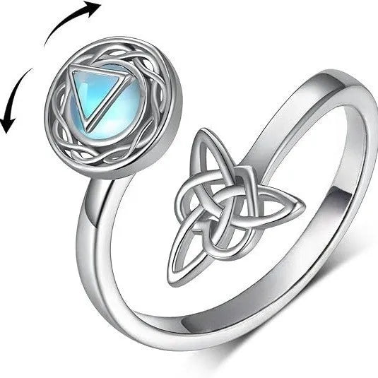 Rotating moonstone ring bracelet in white gold colour with adjustable opening and geometric circle and triangle design