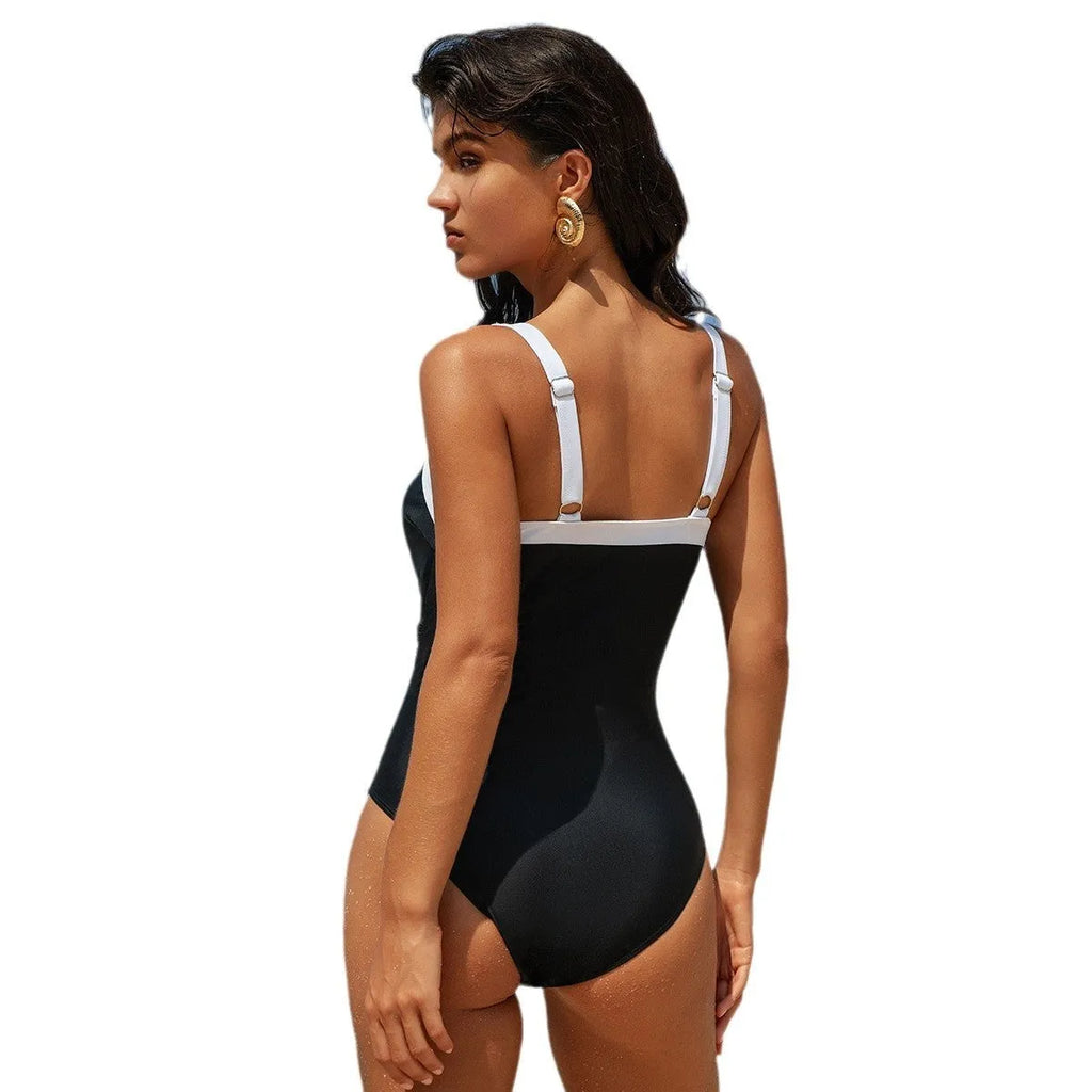 Women's nylon one-piece swimsuit in black and white, sleeveless, with sizes S to XXL