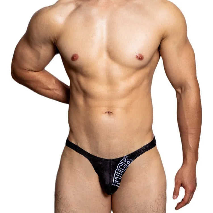 White low waist polyester triangle shorts laid flat, showing briefs style and plain weave fabric.