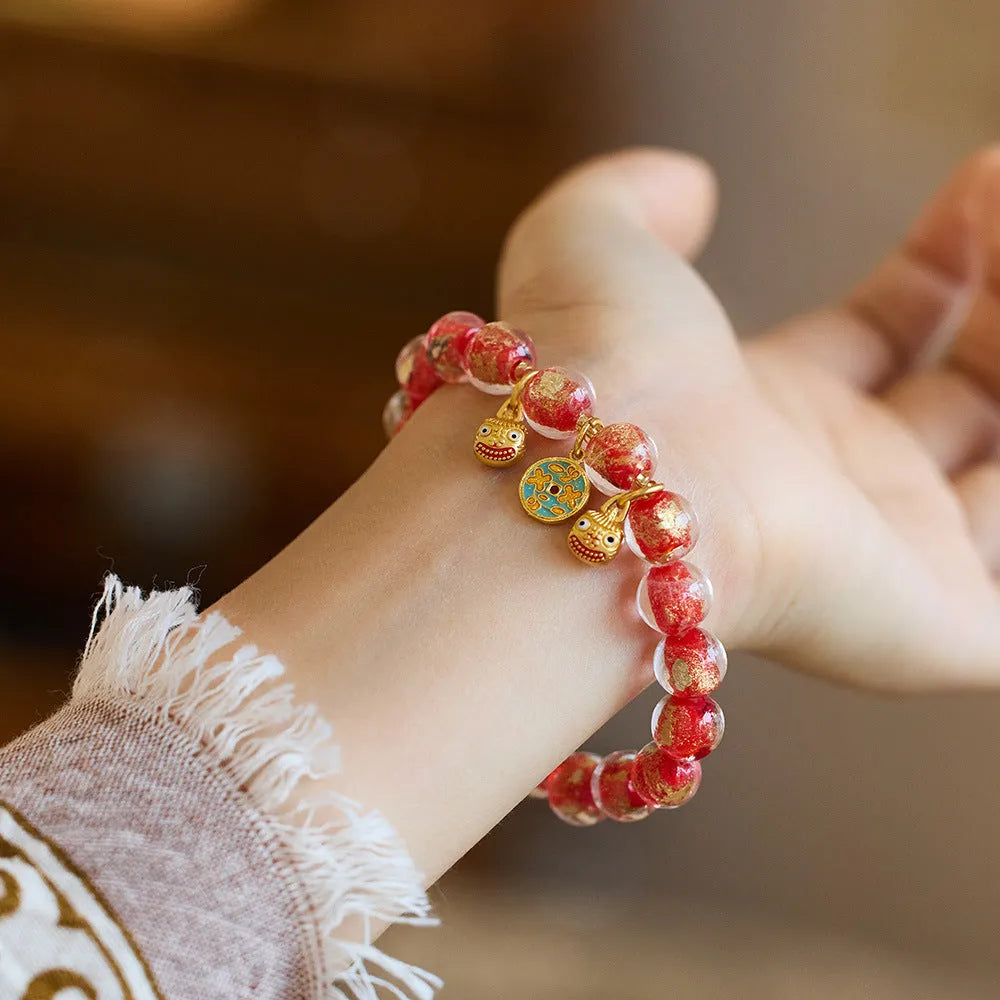Handmade colourful fragrant grey gold foil glaze swallowing gold beast bracelet in geometric shape.
