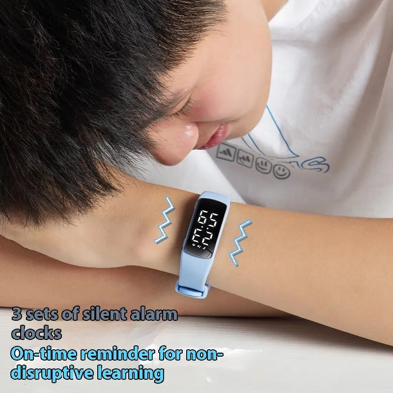 Smart waterproof vibration alarm watch with LED display on a silicone strap, shown in multiple colour options.