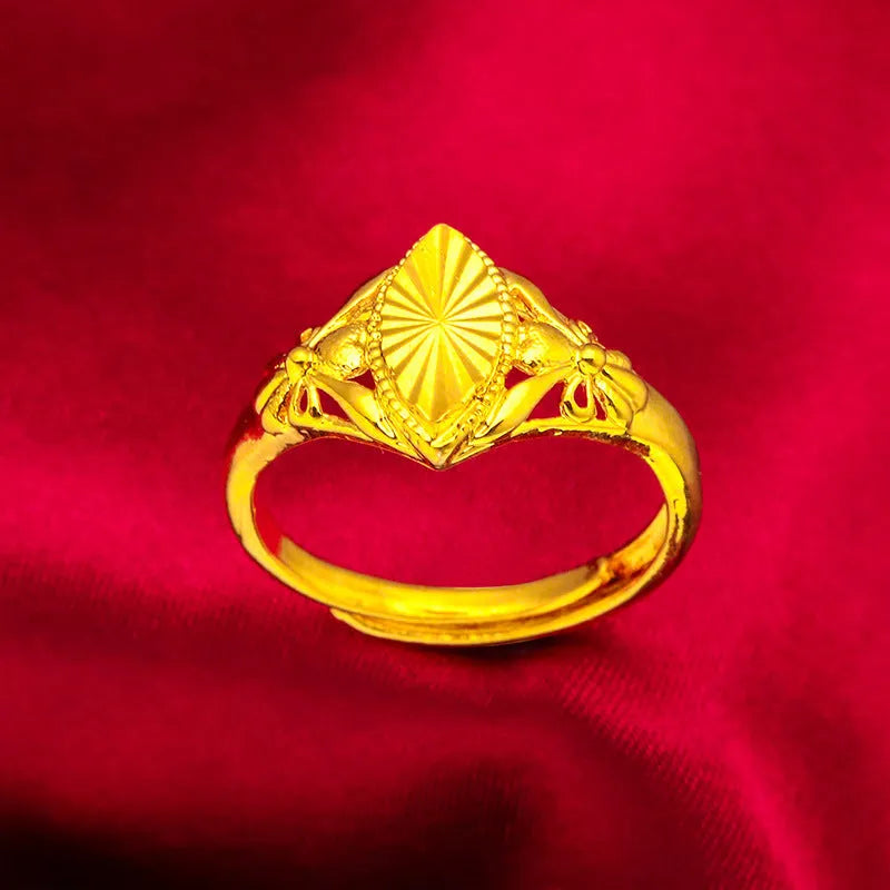 Geometric open flower ring with gold electroplated finish and textured brass surface
