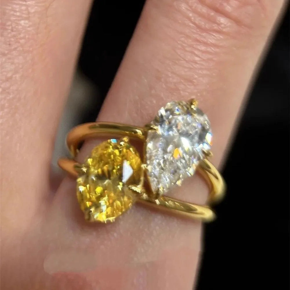 Copper open geometric ring for women with water drop contrast colour double sheng stone setting.
