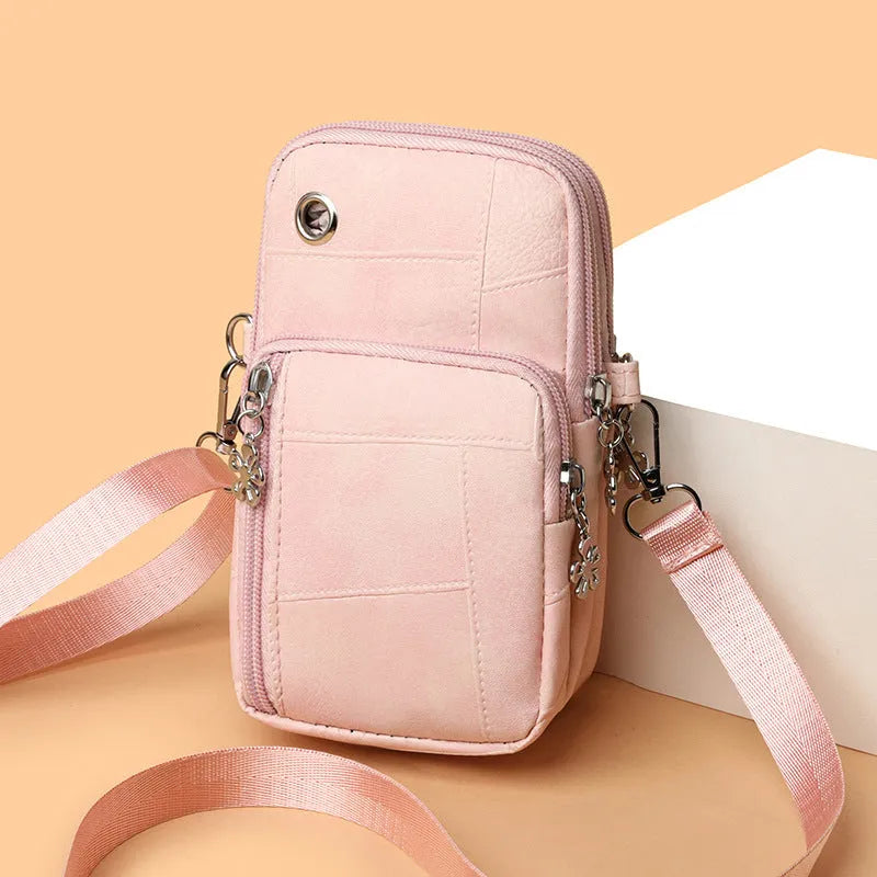 Vertical mini phone bag in square shape with sandwich pocket, shown in brown colour option