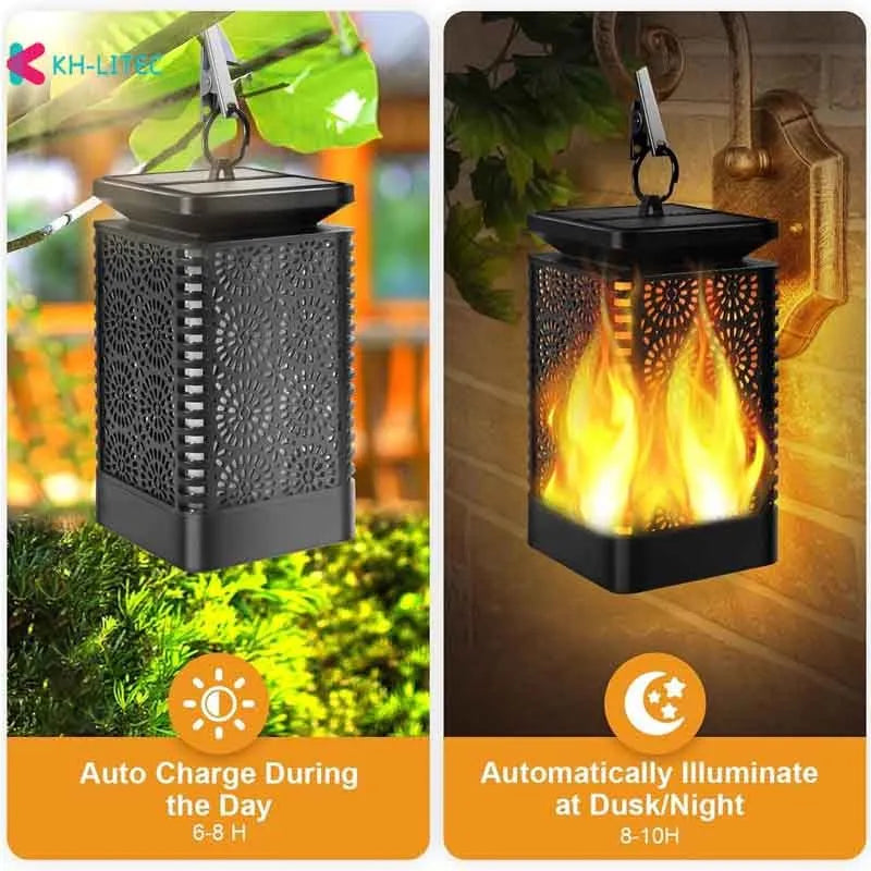 Set of four black solar-powered hanging torch lights with flickering flame LED effect in a garden setting