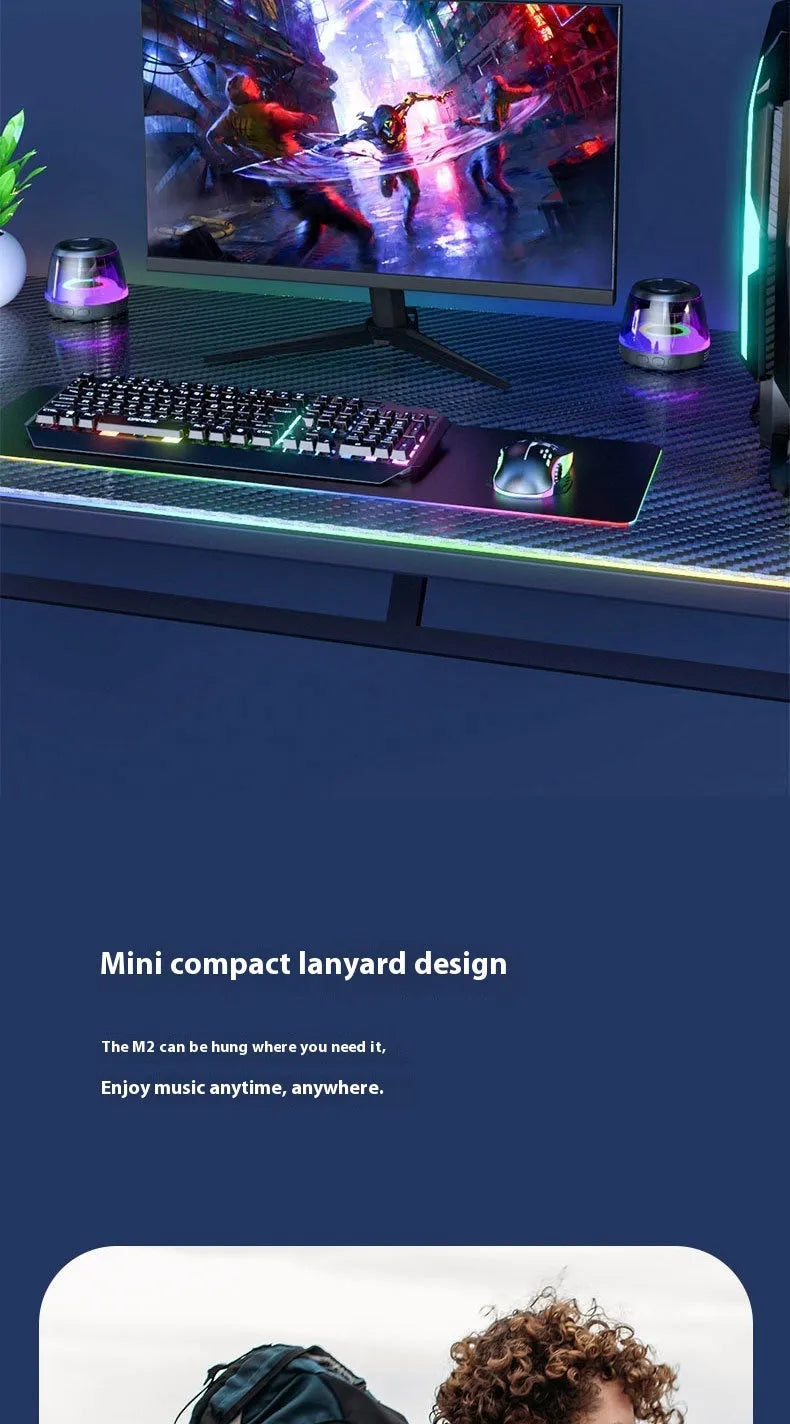 Portable white Bluetooth speaker with ambient lighting and magnetic base for desktop use
