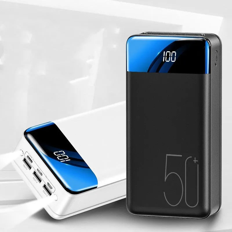 Large black or white 50000mAh power bank showing three USB output ports.