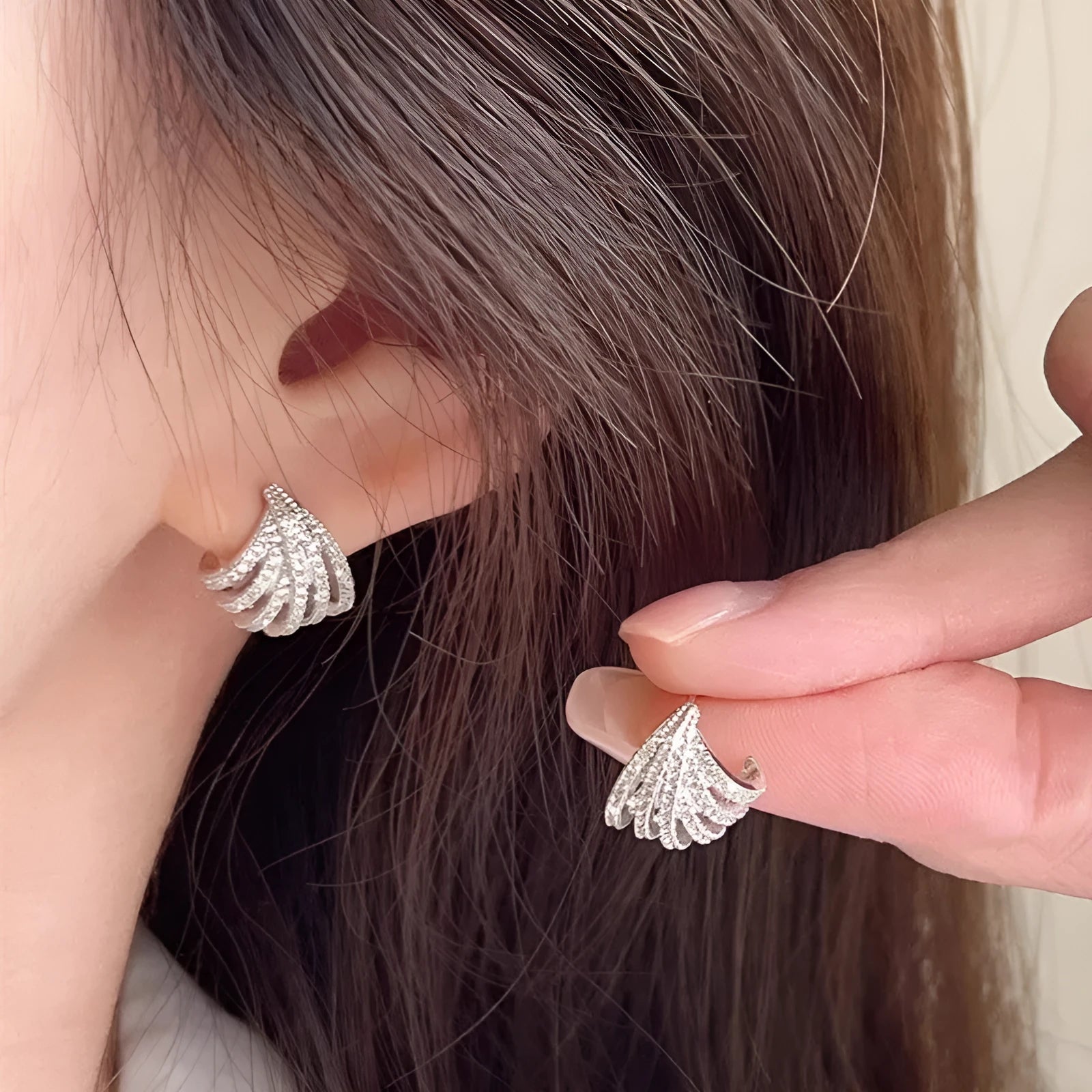Geometric zircon earrings with platinum electroplated finish and line design